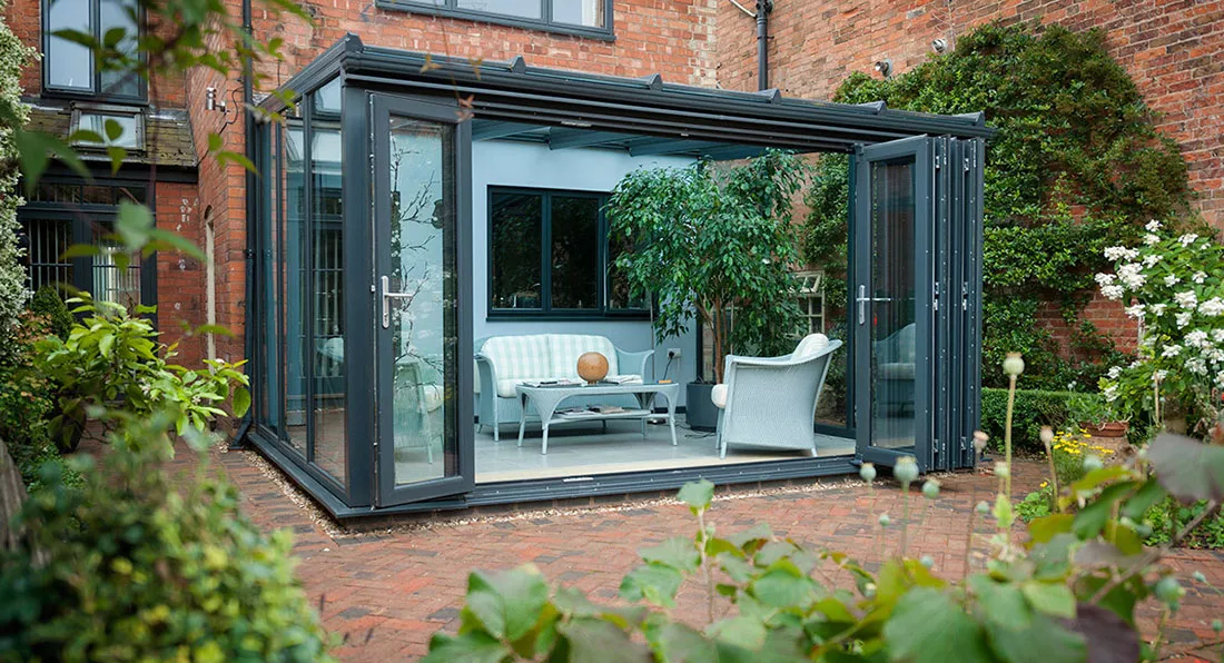This Lean-To conservatory is compact but still very spacious and uses bi-folding doors This Lean-To conservatory is compact but still very spacious and uses bi-folding doors