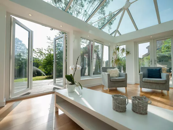Modern Conservatory Featuring French Doors