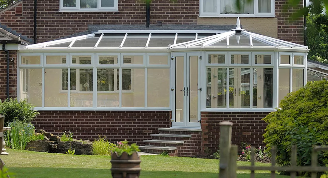 The P-shape formation of this conservatory shows how it can be used as 2 spaces. The P-shape formation of this conservatory shows how it can be used as 2 spaces.
