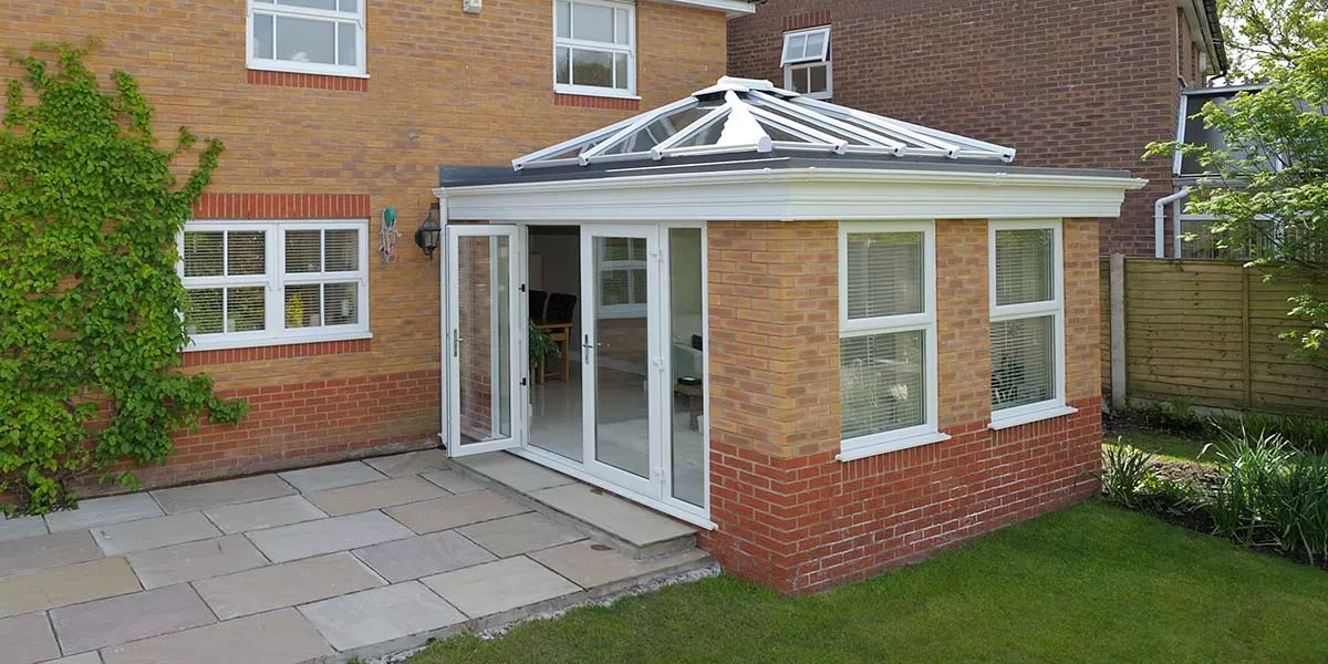 It's the brickwork in this orangery that separates it from a regular conservatory It's the brickwork in this orangery that separates it from a regular conservatory